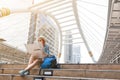 Woman westerner looking at map during city tour in the morning, Royalty Free Stock Photo