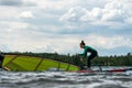 Woman learning how to windsurf