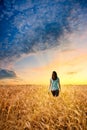 Woman in wheat field Royalty Free Stock Photo