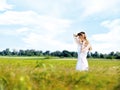 Woman at wheat field on sunny day Royalty Free Stock Photo