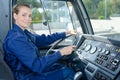 Woman at wheel industrial vehicle Royalty Free Stock Photo