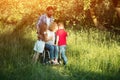 Woman in wheelchair kisses her son among family members Royalty Free Stock Photo