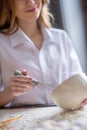 Woman whisking eggs in bowl