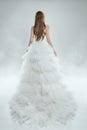 Woman in White Dress Back View, Fashion Model in Long Gown, Bride Beauty Studio Wedding Shot Royalty Free Stock Photo