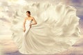 Woman White Dress, Fashion Model in Long Silk Waving Gown, Flying Fluttering Fabric on Wind