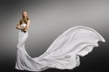 Woman White Dress, Fashion Model in Long Waving Silk Gown Royalty Free Stock Photo