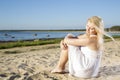 Woman in white dress feeling wind flow Royalty Free Stock Photo