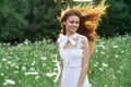 Woman in white dress in a field walk flowers vintage nature