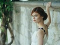 Woman in white dress outdoors in Greece decoration