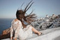 Woman in white dress on Santorini island Royalty Free Stock Photo