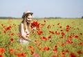 Woman at white dress search beatiful flower