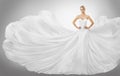 Woman White Flying Dress, Elegant Fashion Model Posing in Gown Royalty Free Stock Photo