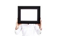Woman in white shirt holding a photo frame. Empty picture frame