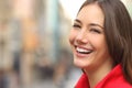 Woman white smile with a perfect teeth in the street