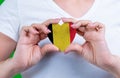 Woman in white t-shirt holds a heart in the form flag Belgium on her chest. Royalty Free Stock Photo