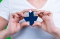 Woman in white t-shirt holds a heart in the form flag Finland on her chest. Royalty Free Stock Photo