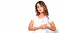 Woman in white t-shirt with pink ribbon supporting breast cancer awareness campaign