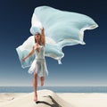 Woman with a white tissue on the beach