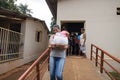 A woman who received a basic food kit donation Royalty Free Stock Photo