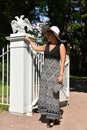 Woman in a wide-brimmed hat and long dress Royalty Free Stock Photo