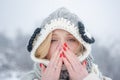 Woman with winter allergy symptoms blowing nose. Portrait Of Young Woman Sniffing Nasal Spray Closing One Nostril