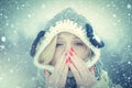Woman with winter allergy symptoms blowing nose. Portrait Of Young Woman Sniffing Nasal Spray Closing One Nostril