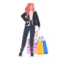 Woman in winter clothes standing near purchases new year christmas shopping seasonal sale concept Royalty Free Stock Photo