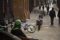 A woman with winter hat on the bench