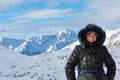 Woman on winter mountain background (Austria). Royalty Free Stock Photo