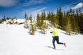 Woman winter running in beautiful inspirational landscape