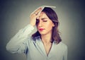 Woman wipes sweat from her forehead with a handkerchief Royalty Free Stock Photo