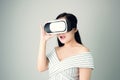 Woman wore a virtual reality headset that simulates, the reality and looked up to see what the virtual reality was capable. Royalty Free Stock Photo