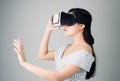 Woman wore a virtual reality headset that simulates, the reality and looked up to see what the virtual reality. Royalty Free Stock Photo