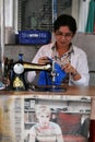 Woman at Work in a Garments Shop