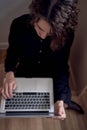 woman work with laptop on the floor