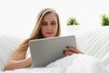 woman work winh laptop stay in bed early morning Royalty Free Stock Photo