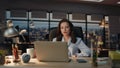 Woman workaholic staying late dark office closeup. Tired businesswoman working Royalty Free Stock Photo