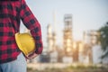 Woman worker hands holding hardhat yellow work helmet Construction Engineer. Refinery woman worker oil petro industry hand hold Royalty Free Stock Photo