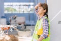 Woman worker tired from work hard overwork fatigue be sick at construction site Royalty Free Stock Photo