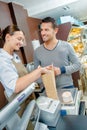 woman worker during transaction at store