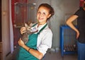 Woman working in animal shelter Royalty Free Stock Photo