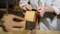 Woman Working As Lute Maker Polishing Classic Guitar Royalty Free Stock Photo