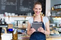 Woman working at cafe