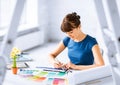 Woman working with color samples for selection