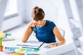 Woman working with color samples for selection