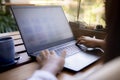 Woman working on computer laptop at outdoor home living room Royalty Free Stock Photo