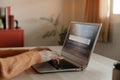 Woman Working on Computer Laptop. Young Freelance Working at Home. Closeup shot