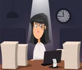 Woman working on computer at night in dark office