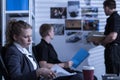 Woman working in criminal department Royalty Free Stock Photo