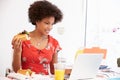 Woman Working In Design Studio Having Lunch At Desk Royalty Free Stock Photo